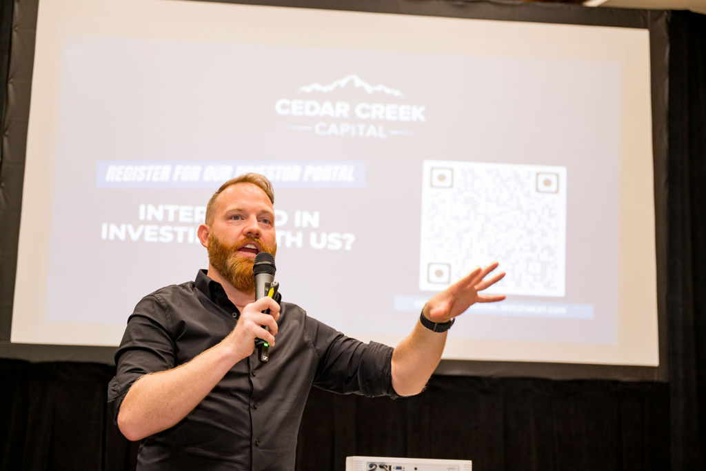 Breakout speaker presenting with a Cedar Creek Capital slide behind him