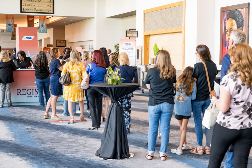 Attendees lined up at the TMRS conference registration desk