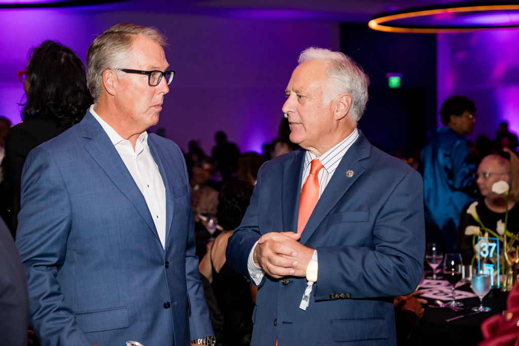Two guests in conversation during the gala reception