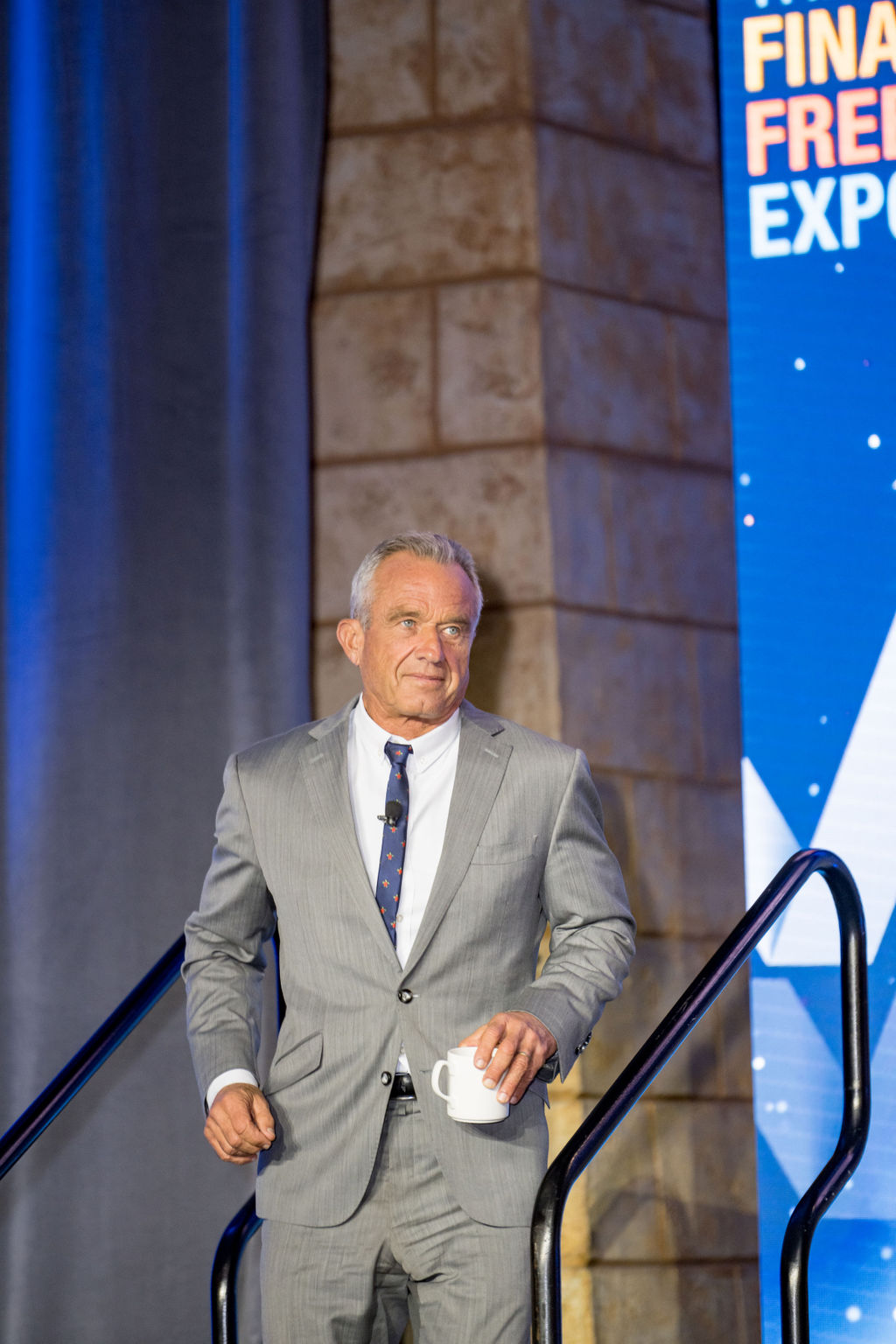 Featured speaker entering the Limitless Expo main stage