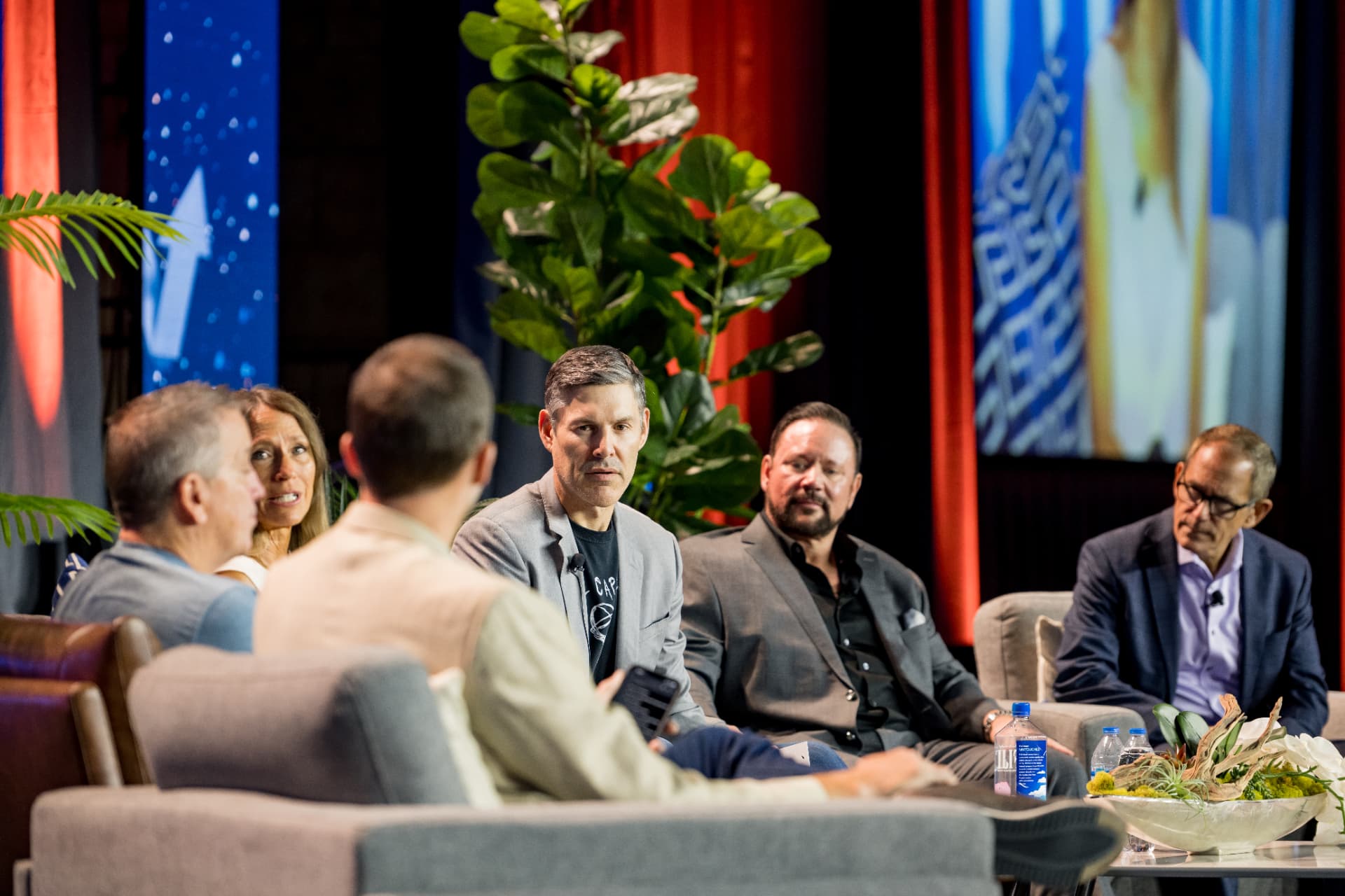 Panel discussion on stage at the Limitless Financial Freedom Expo