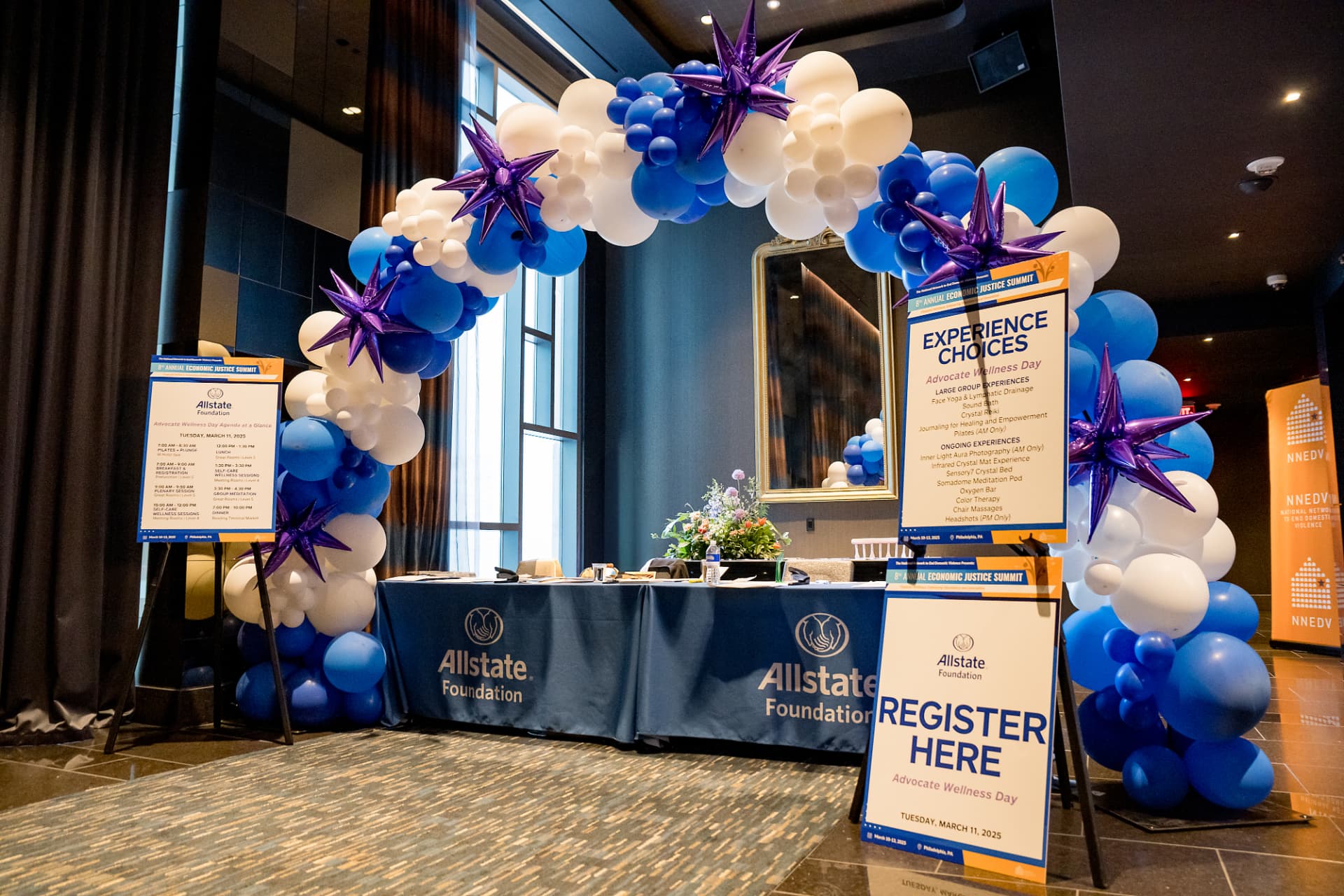 Wide view of the summit registration entrance and signage
