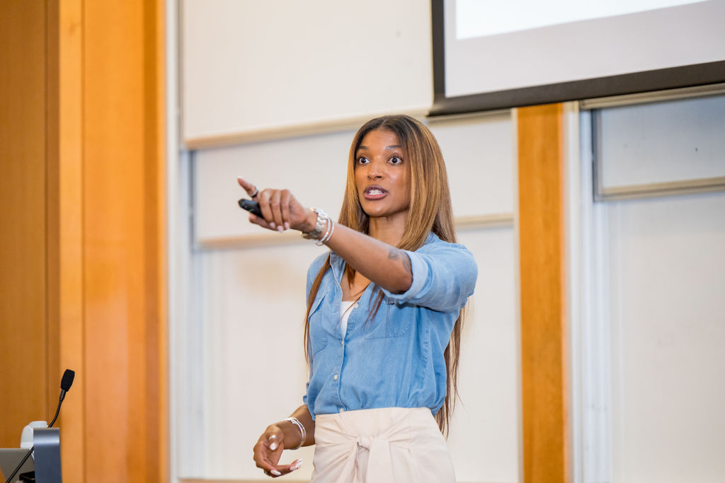 Presenter gesturing while leading a breakout session