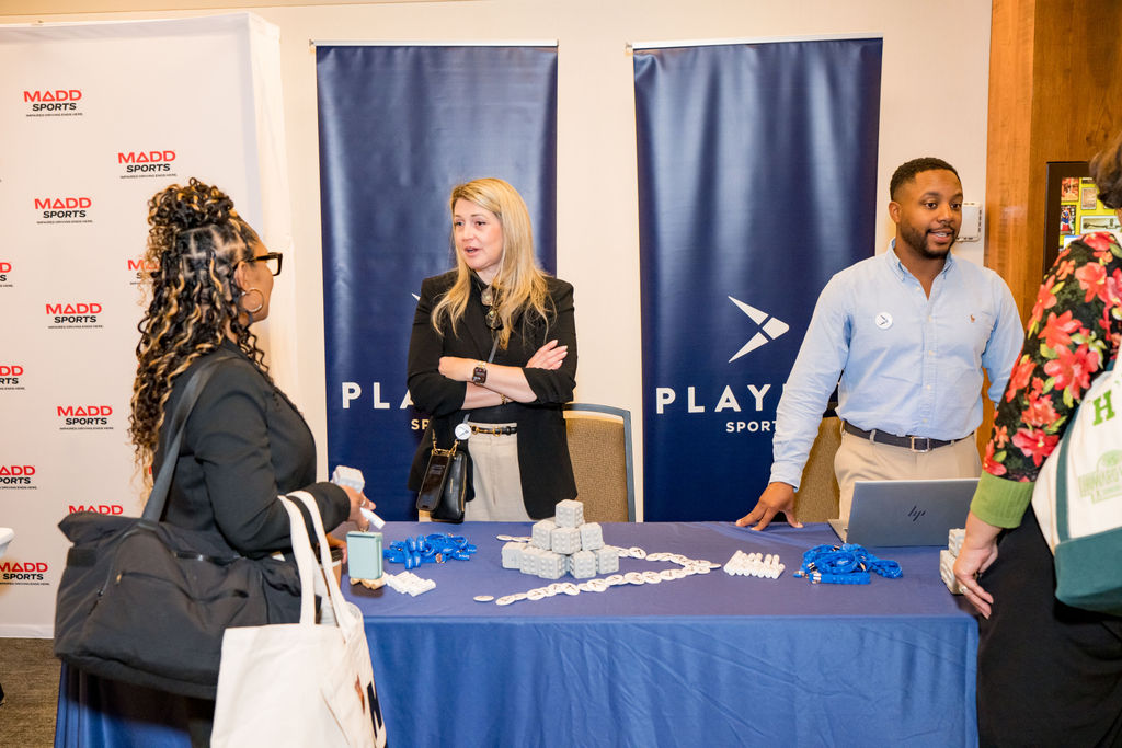 Playa Sports sponsor booth conversation at the BSA Summit
