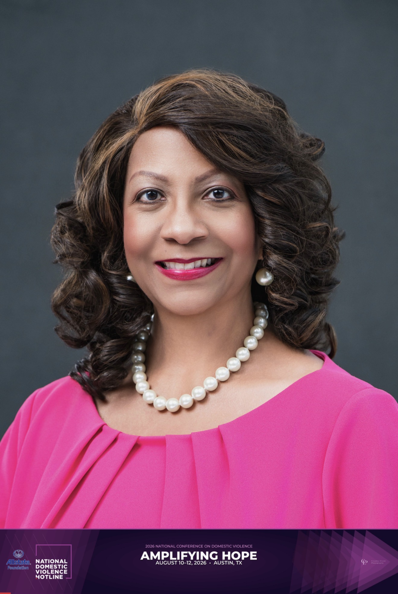 Branded conference headshot example 1 with event logo bar