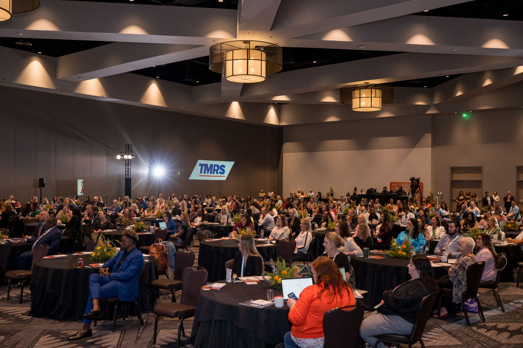 Wide view of the full ballroom audience at the TMRS conference