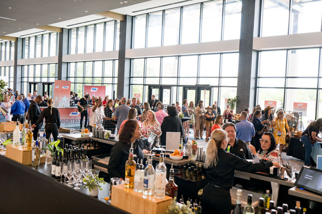 Bar and reception crowd at the TMRS conference welcome party