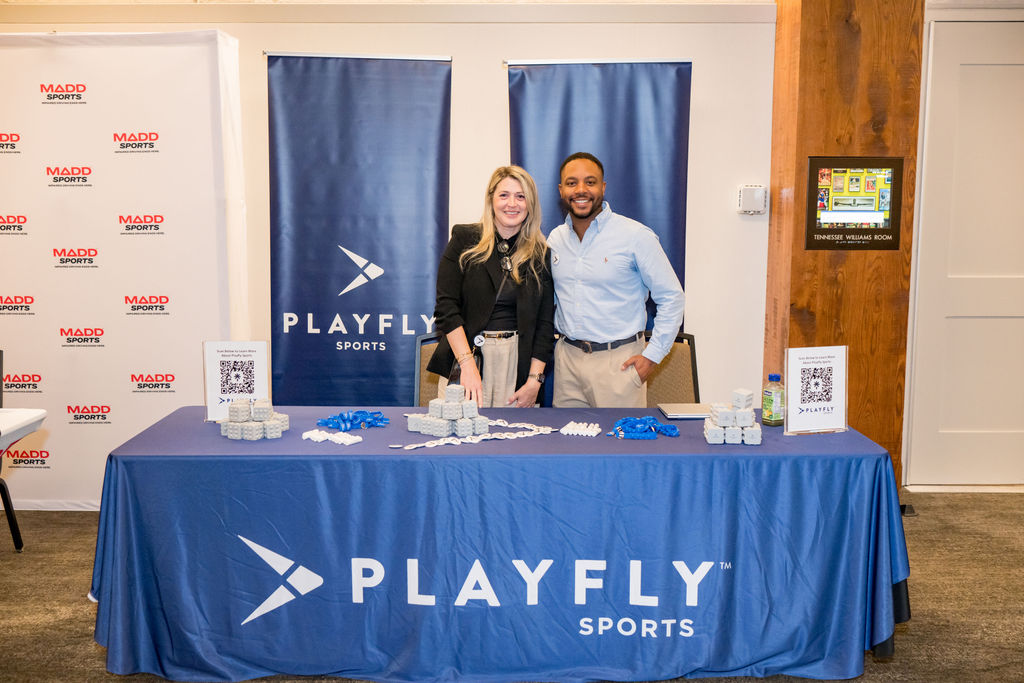 Playfly Sports sponsor booth team at the BSA Summit