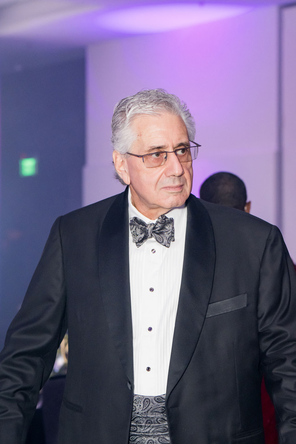 Guest in a tuxedo and bow tie during the evening reception
