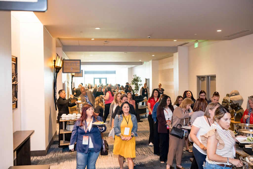 Attendees moving through the lunch buffet line at the TMRS conference