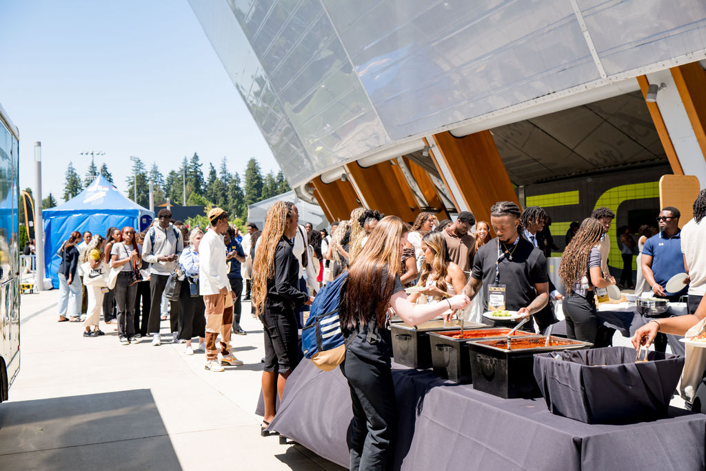 Outdoor lunch line under the stadium concourse